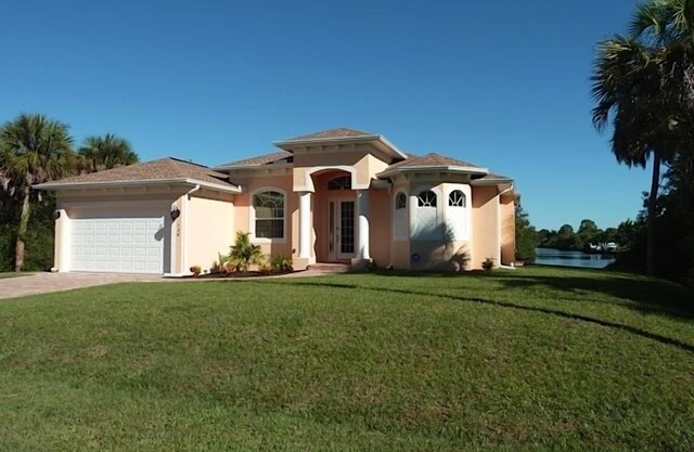 Luxury villa with waterfront, boat dock and heated pool!