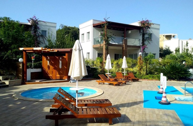 Luxury VIP 3 Bedroom Holiday Villa With Private Garden And Communal Pool.