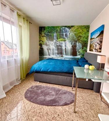 Magisches Doppelzimmer mit atemberaubender Wasserfall-Wand in Seligenstadt