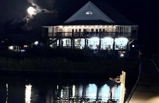 Majestic bayfront home. 450’ pier w/boat access, crabbing, fishing, & swimming.