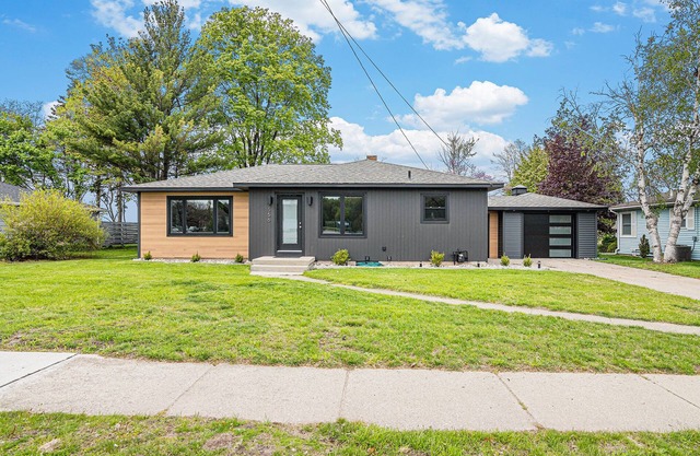 Manistee Channel Waterfront Home with Boat Dock