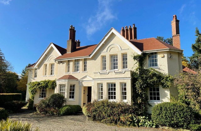 Manor house set in five acres of gardens with private golf course, near Ludlow.