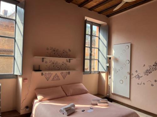 Minimal Studio con travi a vista