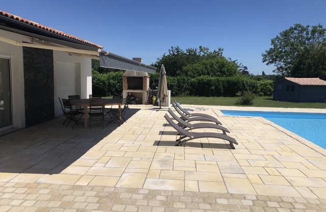 Modern 4 bed villa, air-con in living area, fabulous terrace/garden, large pool.