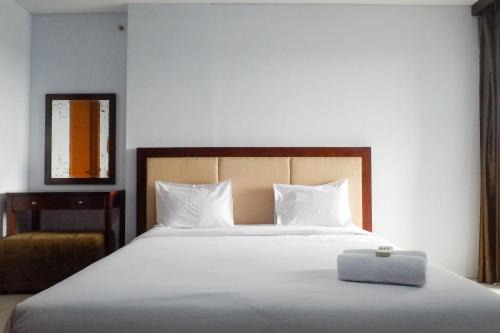 Modern 2BR Apartment at Aryaduta Residence Surabaya Connected to CITO Mall By Travelio