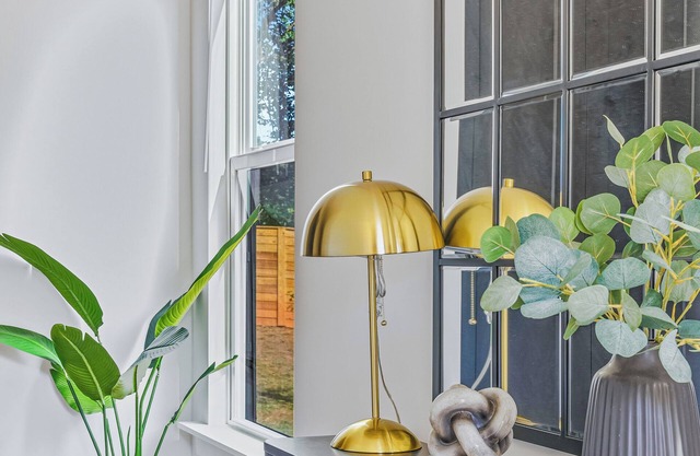 Modern 4BR Home Near Uptown & Camp North End- Sleeps 12, Sports-Themed Game Room