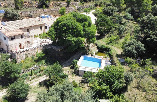 Modern cottage in the mountains with swimming pool and playground