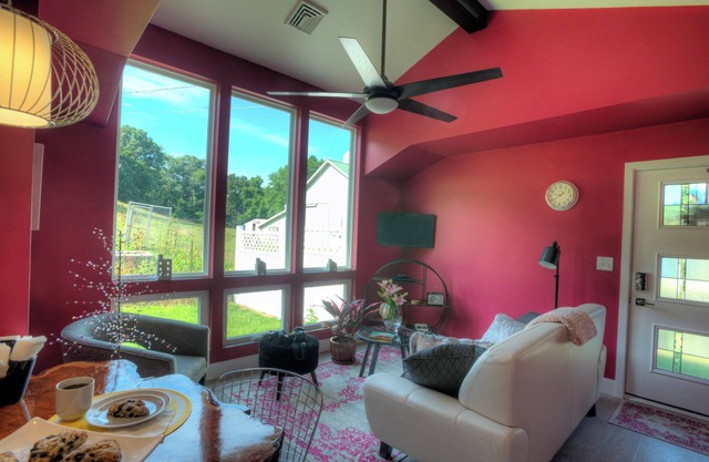 Modern country cottage that is dog friendly with a fenced-in yard.