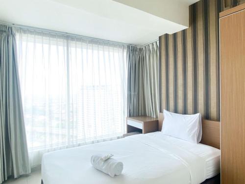 Modern Look 2BR at Grand Kamala Lagoon Apartment By Travelio