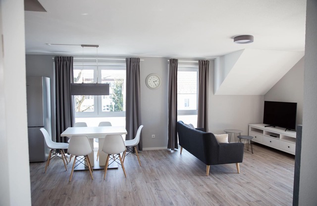 Modern new-build apartment with 35 sqm roof terrace + fireplace