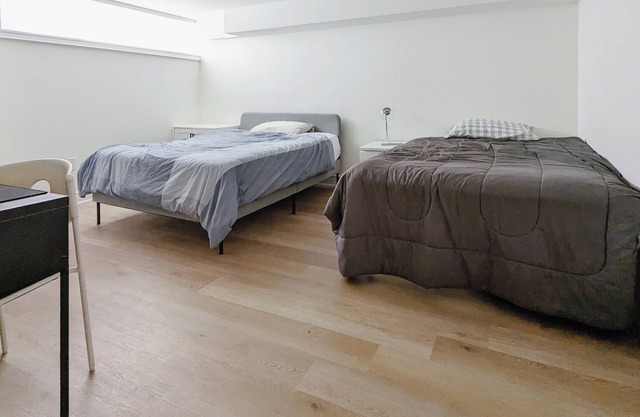 Modern, newly renovated 2 bedroom basement apartment w/ private entrance