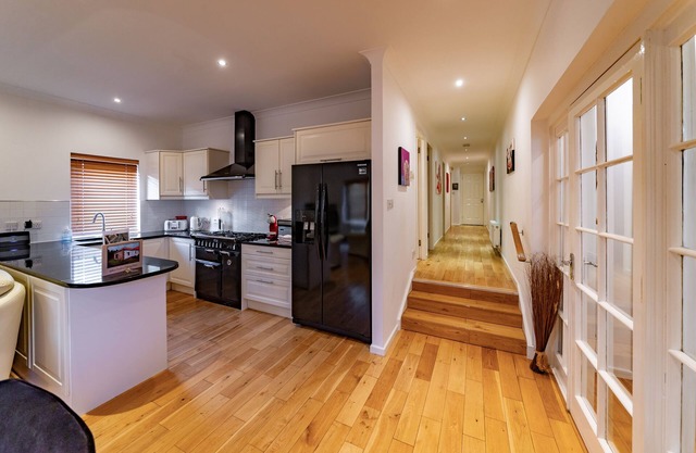 Modern, open, comfortable home within walking distance of Golf courses and beach