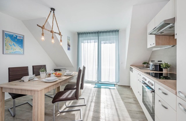 Modern vacation apartment in Loddin with garden, WLAN & barbecue - quiet, close to the beach, mod