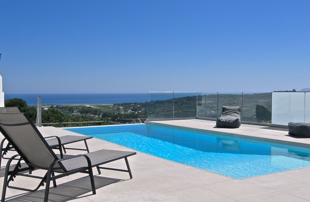 Modern villa with infinity pool close to the sea