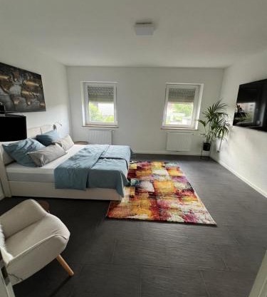 Modernes Zimmer am Campus 1 mit Gemeinschaftsbad