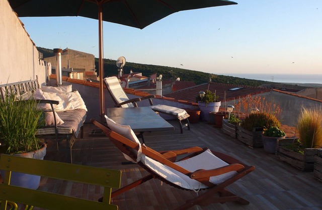near Bosa, terrace with sublime sunsets over the sea
