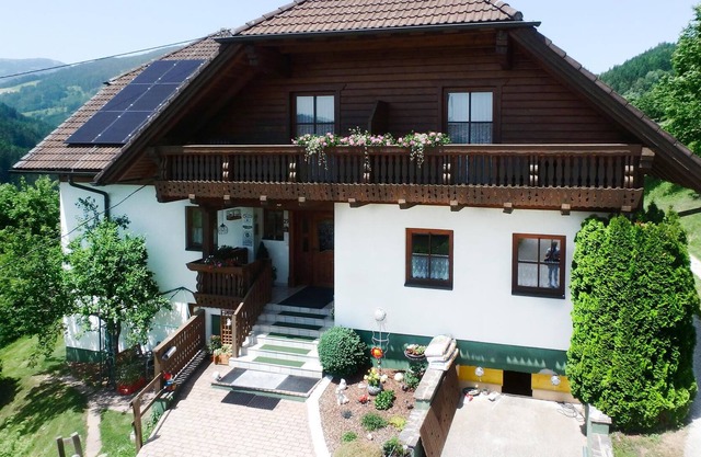 Nestled in a landscape of forests, alpine meadows and mountains, these two vacation apartments (AKA1