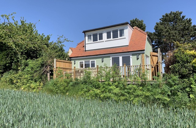 New lodge with stunning views. Close to country, city and coast.