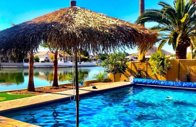 NEW! Luxury Lakefront Estate with Pool and Putting Greens