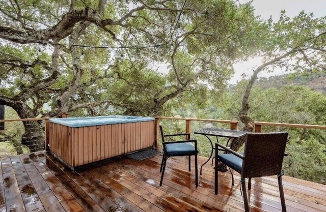 New! Soak in a Hot Tub at this Romantic Tree House Surrounded by Trees