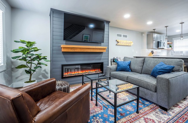 Newly renovated retreat in the heart of Lawrenceville with parking and a yard!