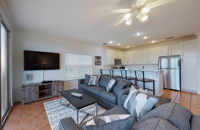 Newly renovated waterfront condo with pool, WiFi, W/D, & central AC