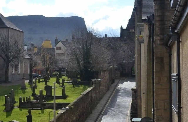 Next to the Palace and Royal Mile with parking