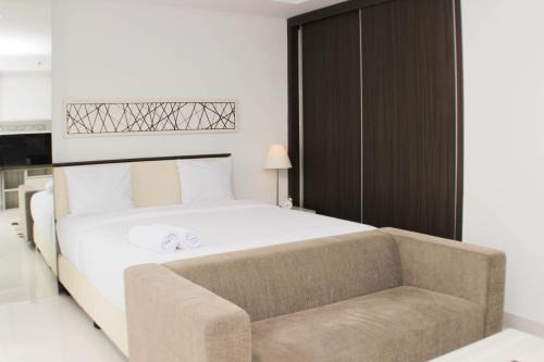 Nice and Comfy Studio Azalea Suites Apartment By Travelio