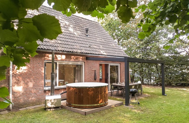 Nice home in Hoeven with sauna