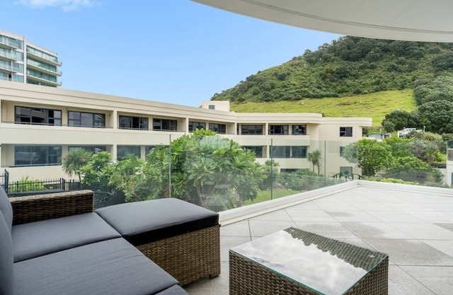 Oceanside Apartment with Garden Views