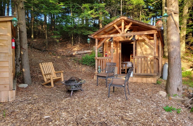 Off Grid Cabin nestled in the woods next to a stream at the base of Tug Hill
