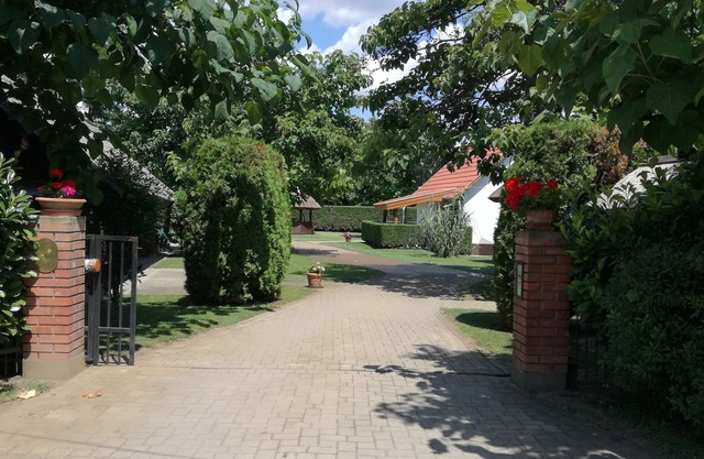 Old, reed-covered farmhouses next to Lake Tisza, near the Puszta