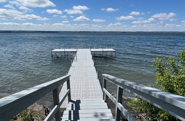 On the Lake, in the Village, Sunsets at your Door!