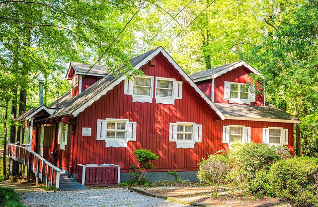 One of a kind our Mini Lodge Chalet directly across from our pool!
