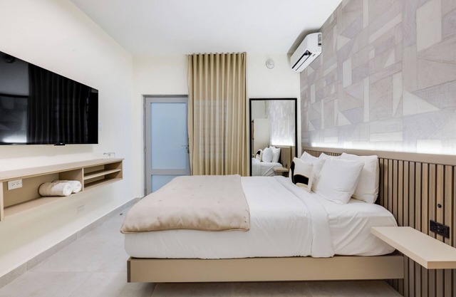 Otium | 5 Min Beach Distance | Saltwater Pool | Gym | Cocktail Bar