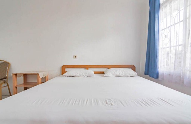 Pall Inn Puncak Mitra RedDoorz