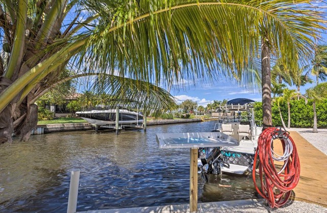 Palm City Canalfront Home with Boat Dock and Fire Pit!