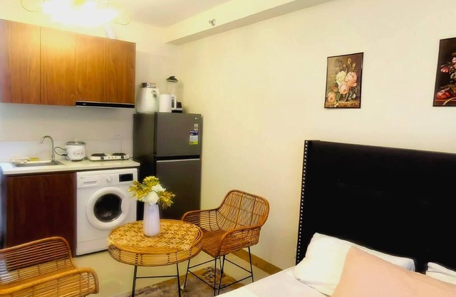 Panoramic Pool Views in Luxurious Lapu-Lapu City Condo