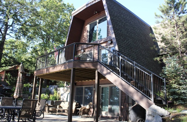 Picturesque lake home w/separate entertainment lodge