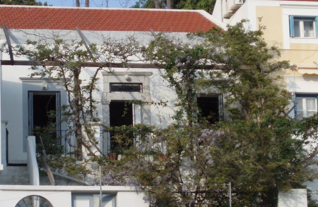 Pretty village house with very nice view over Symi harbour from large terraces.