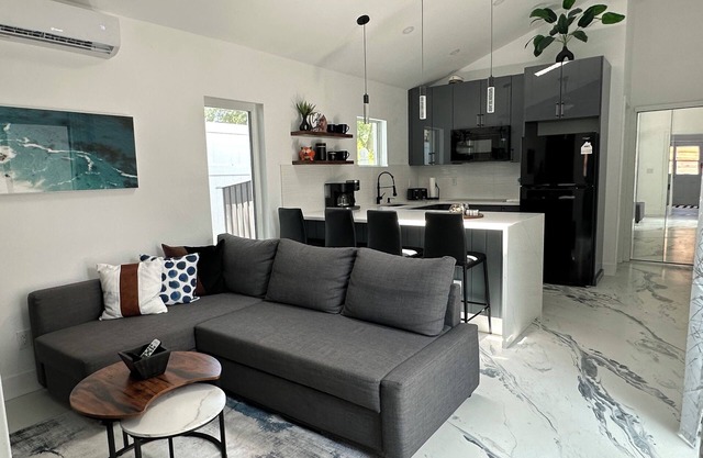 Private guest house with king bed & loft. Deck with hot tub and putting green