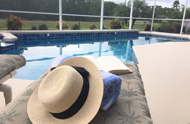 RATES REDUCED Close to Disney. 5 Star home. Fantastic pool area, large lanai.