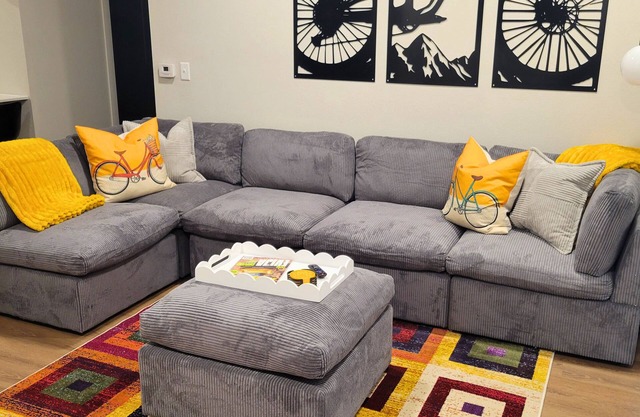 Relax in Style Charming 1BR w/sectional ,Pool, Gym, Free Parking & All the Comforts of Home