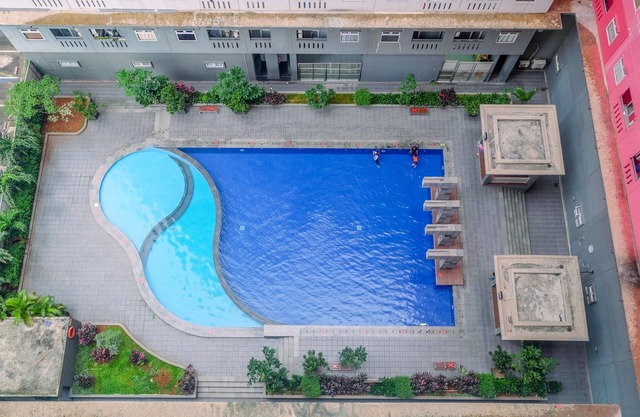 Relaxing 2BR at Green Pramuka Apartment