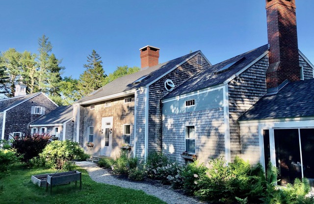 Rocky Bay is a waterfront home with dock, float & beach and sleeps 12.