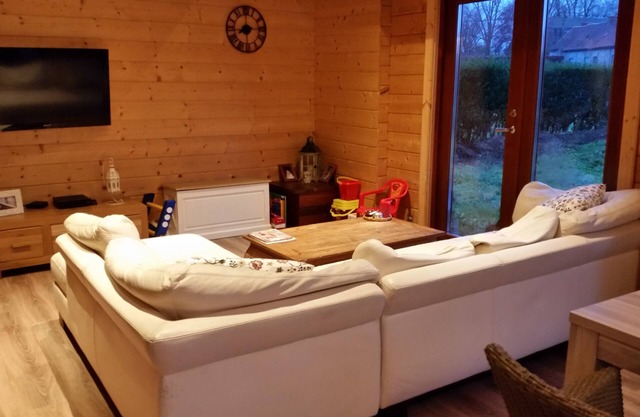 Room for rent in a wooden house.