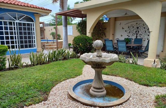 Room in Apartment - Cozy Mérida Retreat With Pool & Garden View