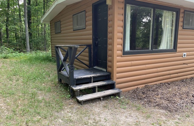Rustic cabins in secluded campground with lake access and woods to wander in.
