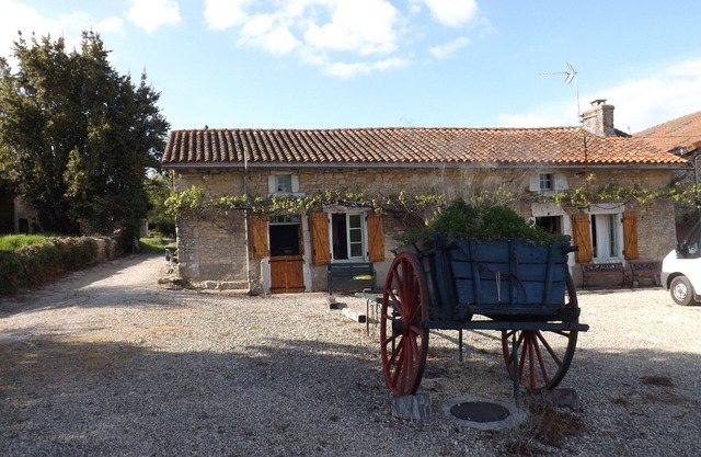 Rustic rural cottage with gravel garden and extensive grounds