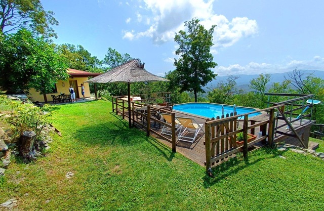 Rustico farmhouse with garden and swimming pool in a hilly area